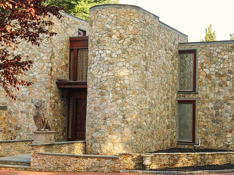 casa prefabricada con fachada Piedras naturales